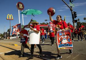 Higher prices on the menu as fast-food chains brace for big minimum wage jump