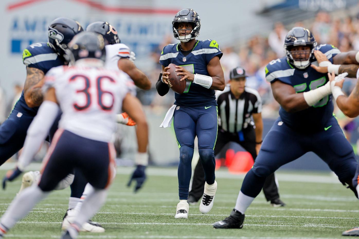 Geno Smith and Drew Lock competing for the Seahawks' starting QB role 