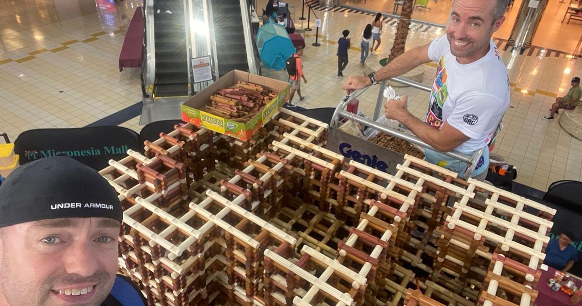 Tower for Humanity team completes 31-foot toy timber log replica of Empire State Building at Micronesia Mall
