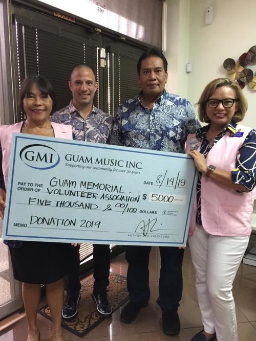 Guam Music Inc. donates $5K to GMHVA