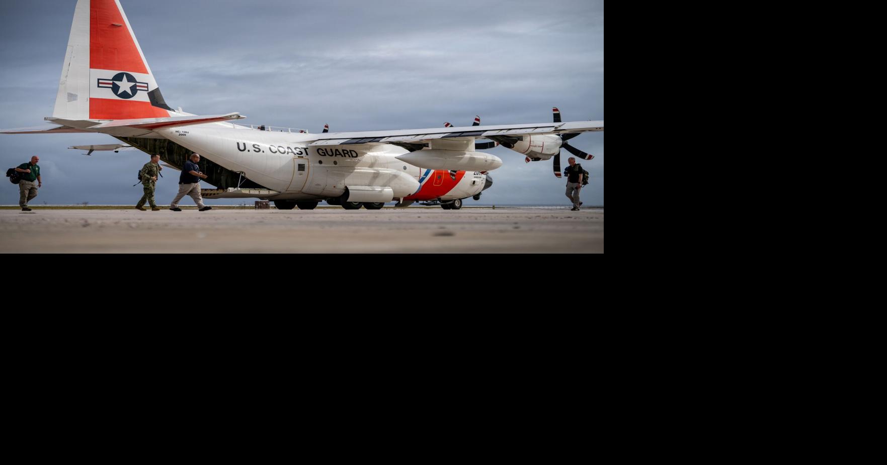 Coast Guard spots overturned boat as search for 6 continues