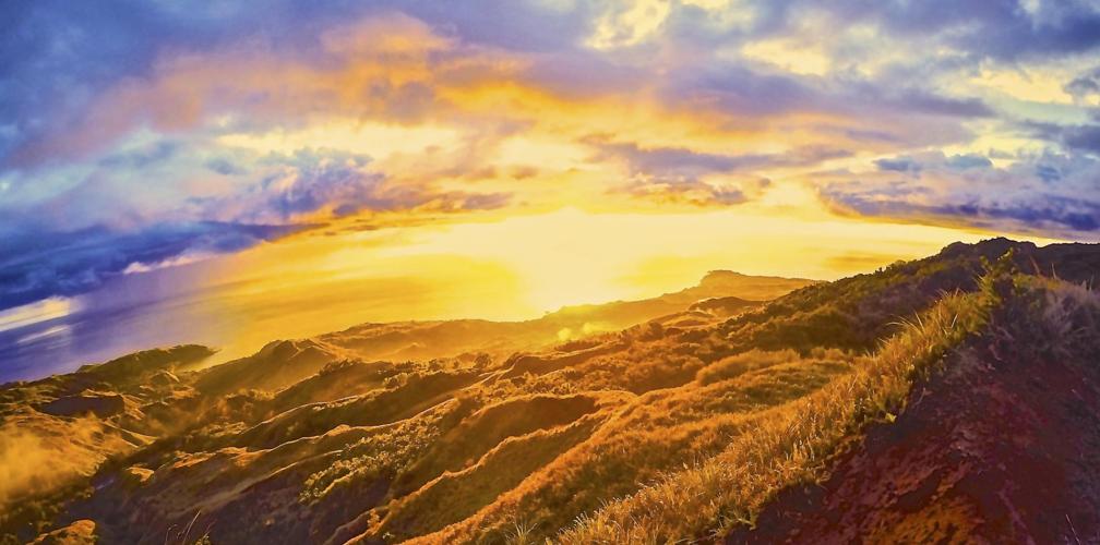 Enjoy a sunset from the best spot on island – atop Mount Jumullong Manglo