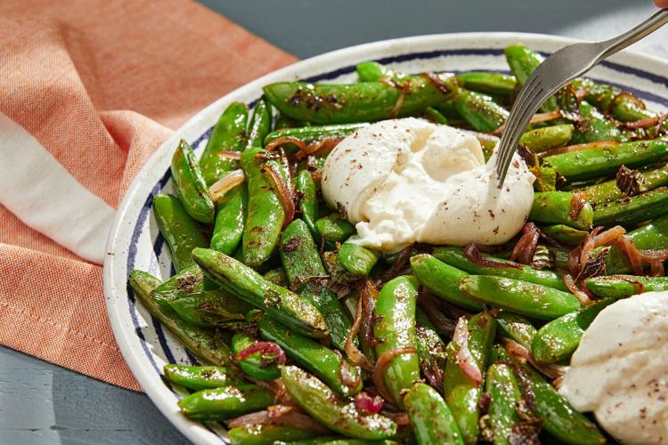 A crisp snap pea salad turns indulgent when paired with burrata