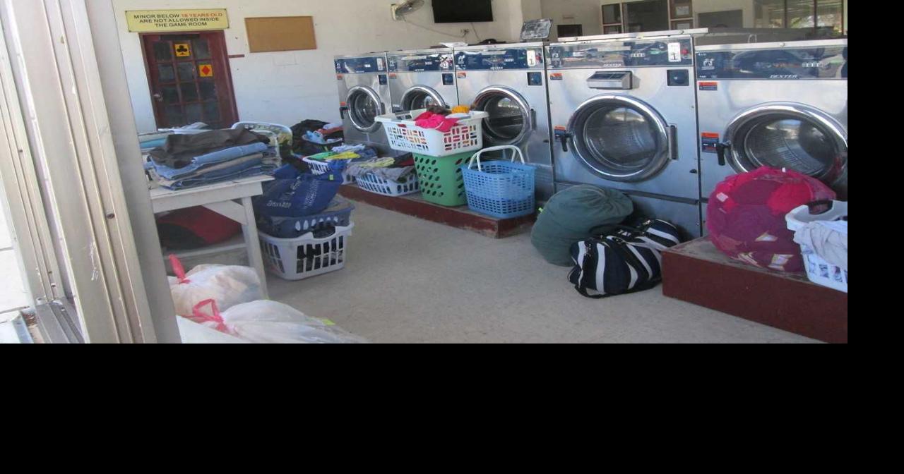 Saipan residents face long lines at laundromat, live in cramped