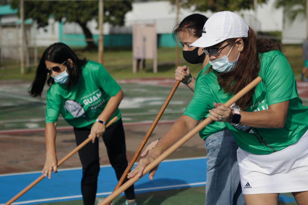 Guam Pacific Tennis Club volunteers give Tamuning courts a facelift