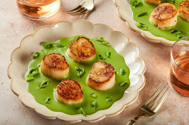 Serve seared scallops on a creamy herb sauce for a quick, elegant meal