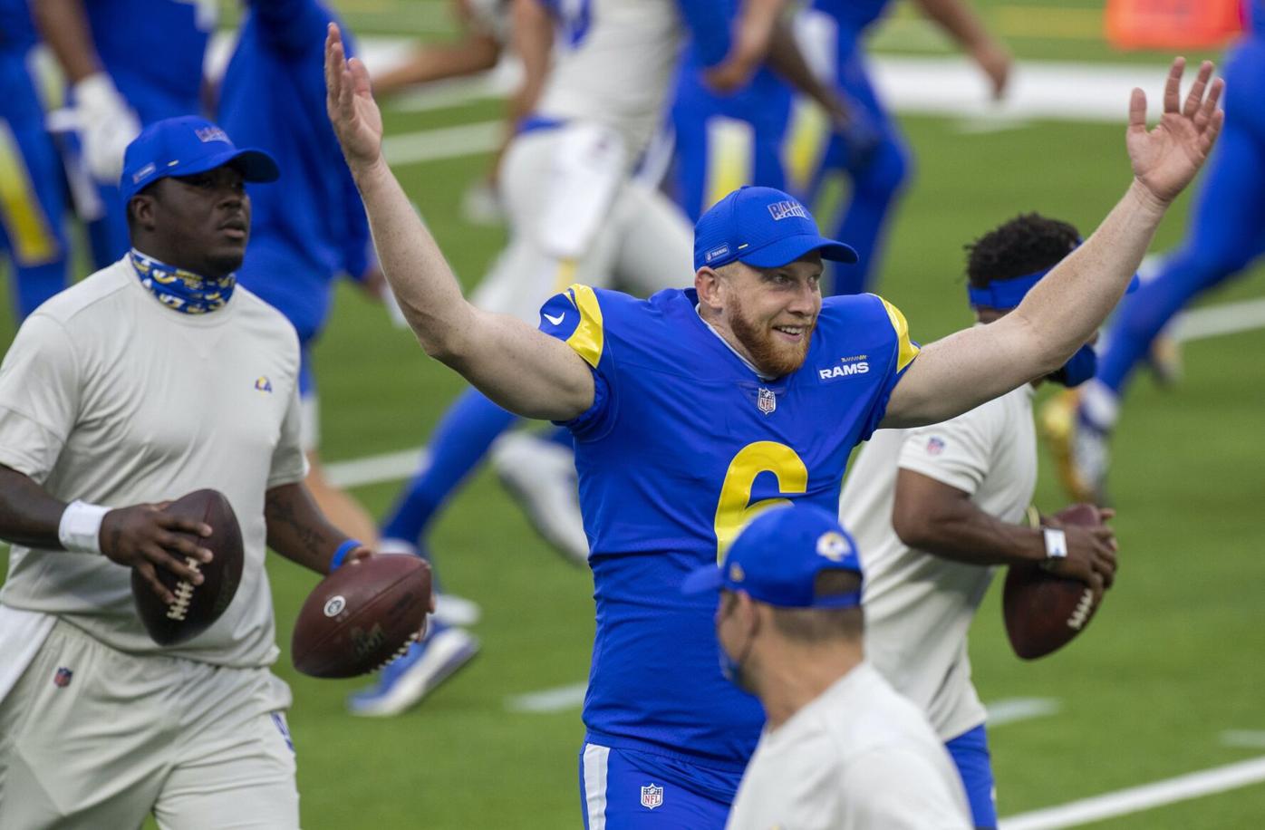 Punter Johnny Hekker of the Los Angeles Rams throws the football