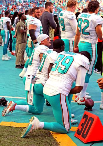 Miami Dolphins to discipline players who protest during national anthem  with suspensions, fines or both