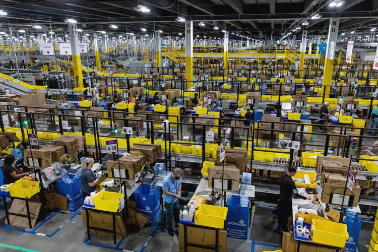 Amazon closes, abandons plans for dozens of warehouses