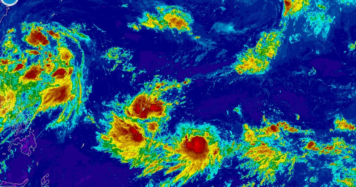 Typhoon threat builds as rain soaks Guam