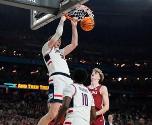 Defending champion UConn downs Alabama, to face Purdue in final