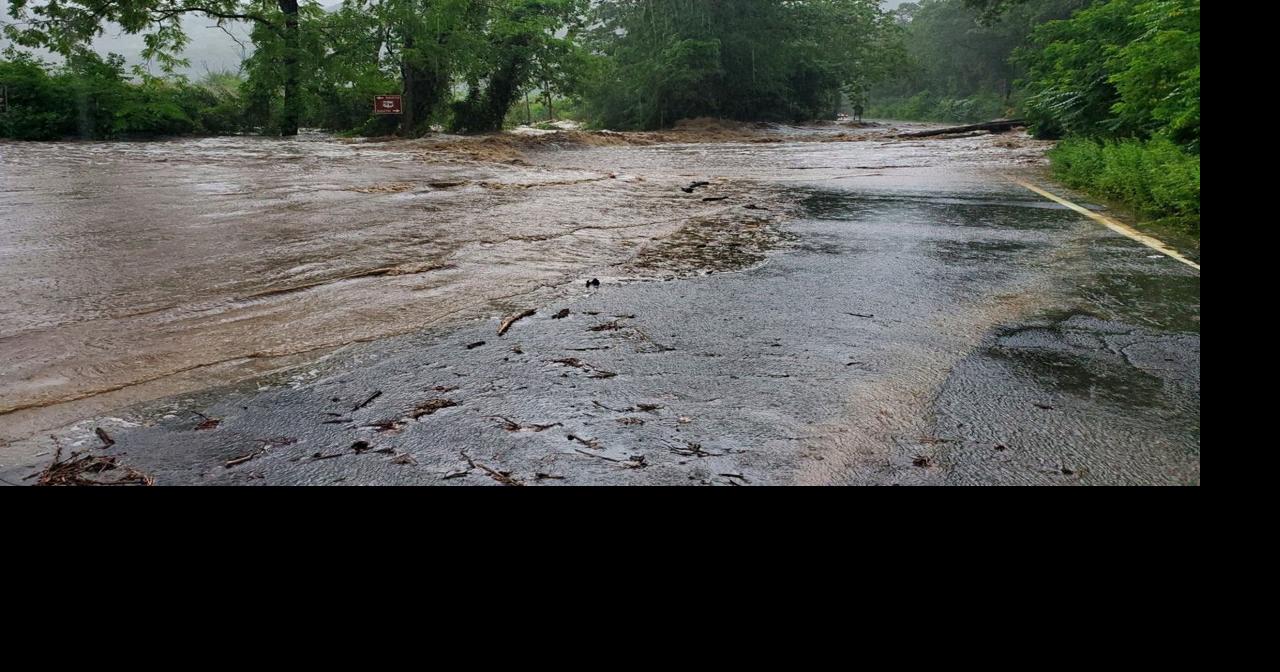 Historic and deadly New England storms: Rain, floods destroy roads ...