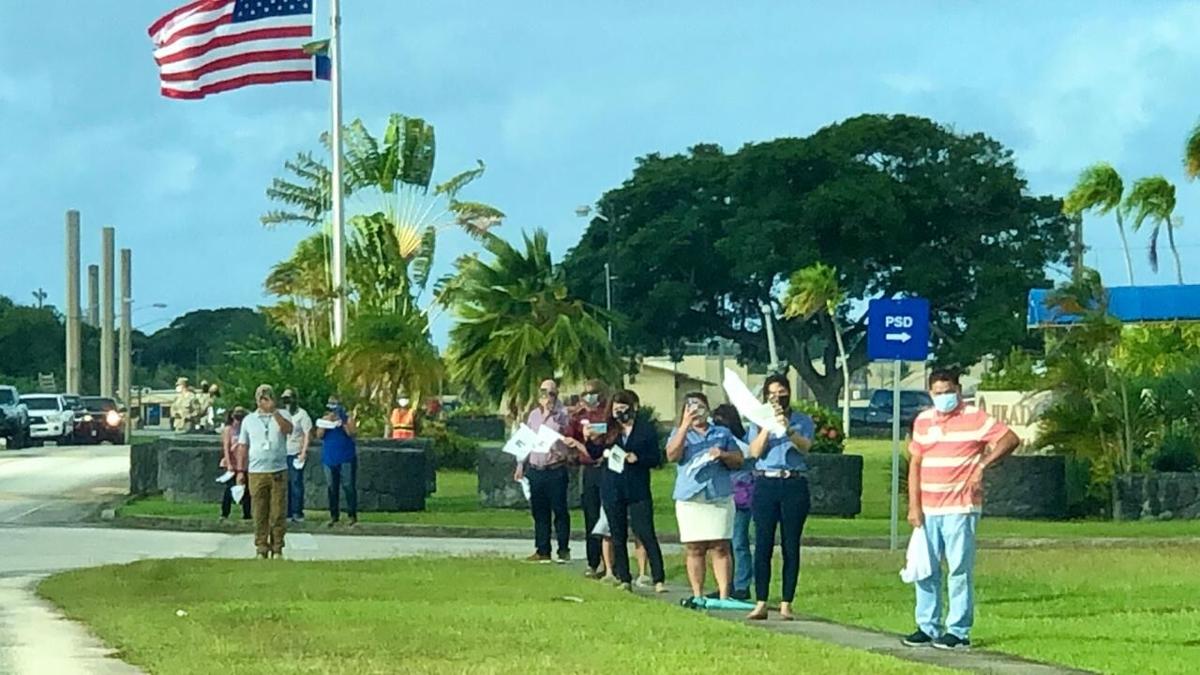 Thousands greet patron saint's drive around the island