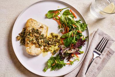 Simply seared fish gets a briny finish with this caper-olive salsa