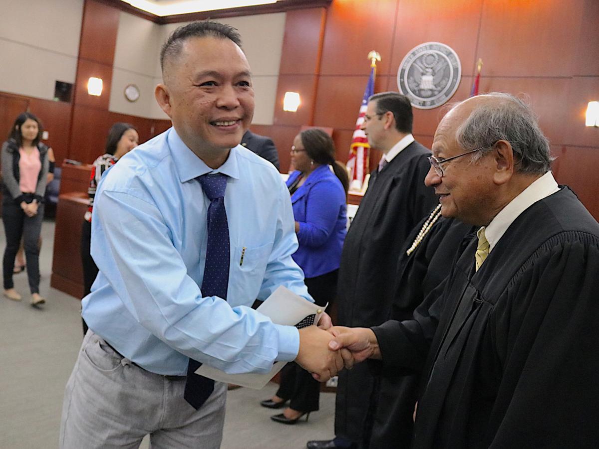 New US citizens take oath Guam News