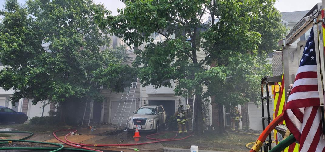 UPDATED Gas grill blamed in fire that damaged 4 townhomes, displacing