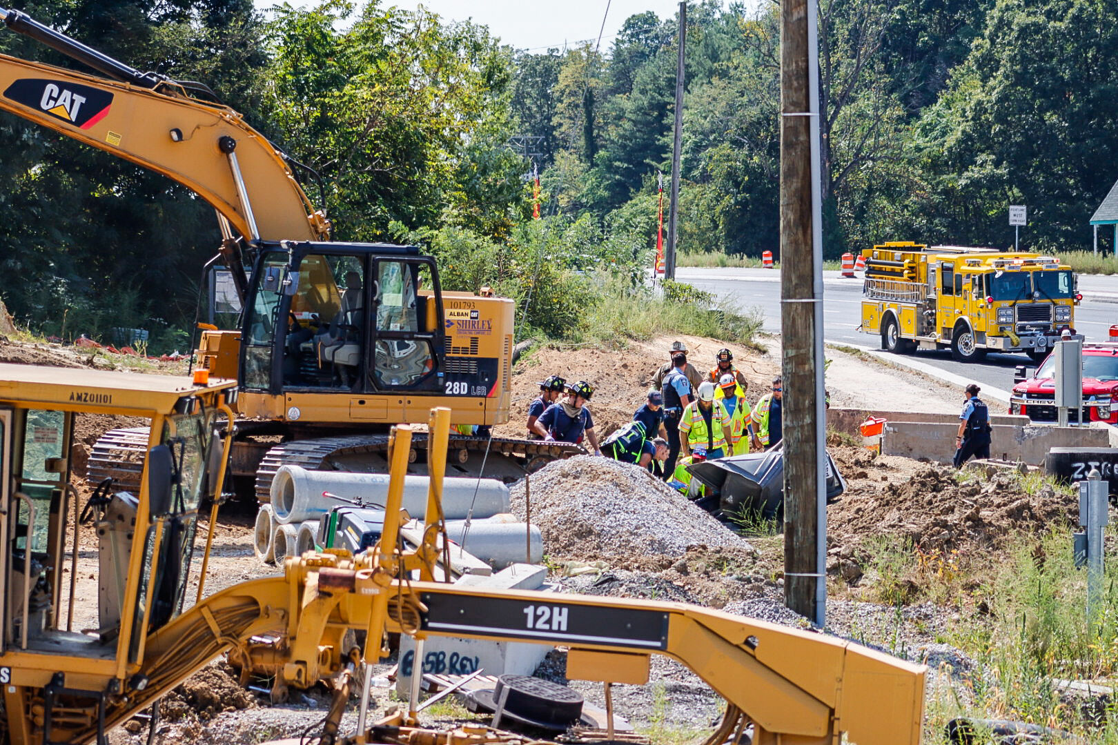 Construction worker suffers life-threatening injuries after backhoe ...
