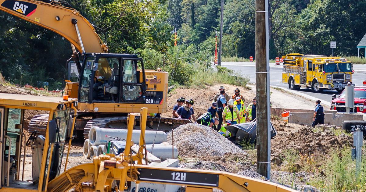 Portaloo Fail Construction worker suffers life-threatening injuries after backhoe ...