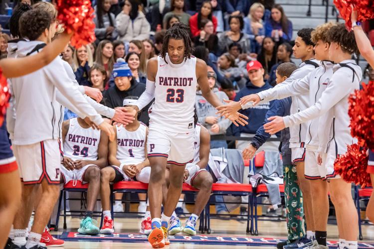 PATRIOT BOYS BASKETBALL Tough defense leads Pioneers over Landstown 5236 and into state semis