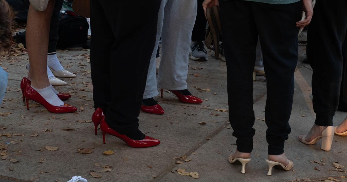 Footwear Checklist.pdf walk a mile in her shoes, red heels standing | | psucollegian.com