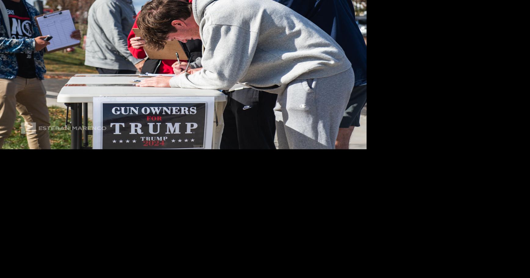 Outside Trump Rally, Student signs Elon musk petition | | psucollegian.com