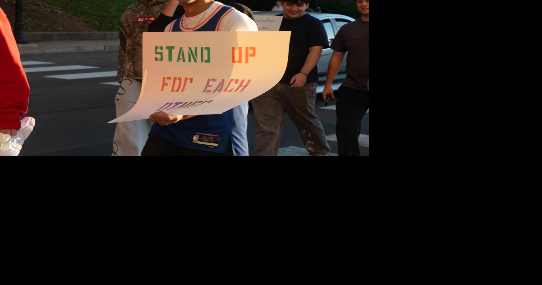walk a mile in her shoes, student with sign | | psucollegian.com