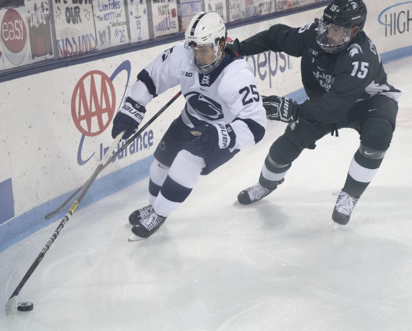 Former Penn State men's hockey forward Nikita Pavlychev re-signs