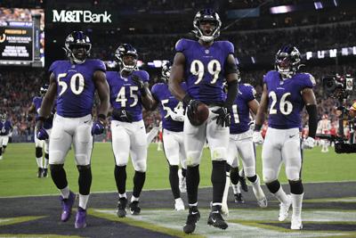 Baltimore Ravens linebacker Odafe Oweh (99) walks off the field