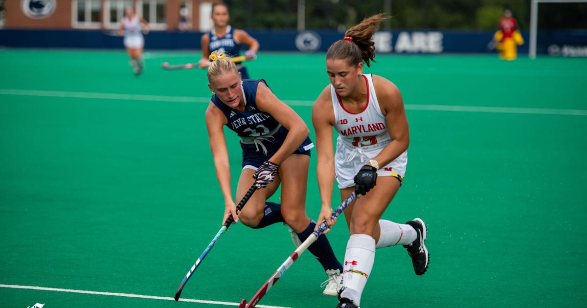 Penn State field hockey vs. Maryland action photo from the Big Ten opener, showing Penn State midfielder Madison Britton and Maryland forward Jordyn Hollaman.