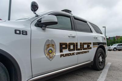 9/6/22 Police Stock Photos, Purdue police car door