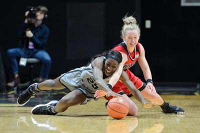 Women S Basketball Holds On To Defeat Huskies 68 63 Basketball