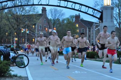 Runners strip for Nearly Naked Mile | Campus | purdueexponent.org