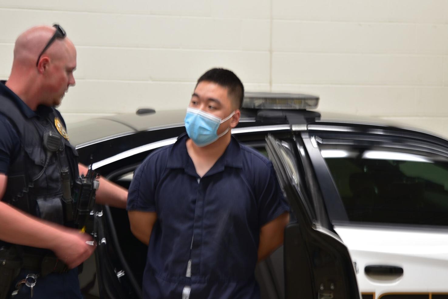 Ji Min Sha arrives at jail Campus purdueexponent org