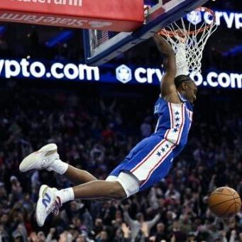 Sixers down Rockets behind Embiid triple - double