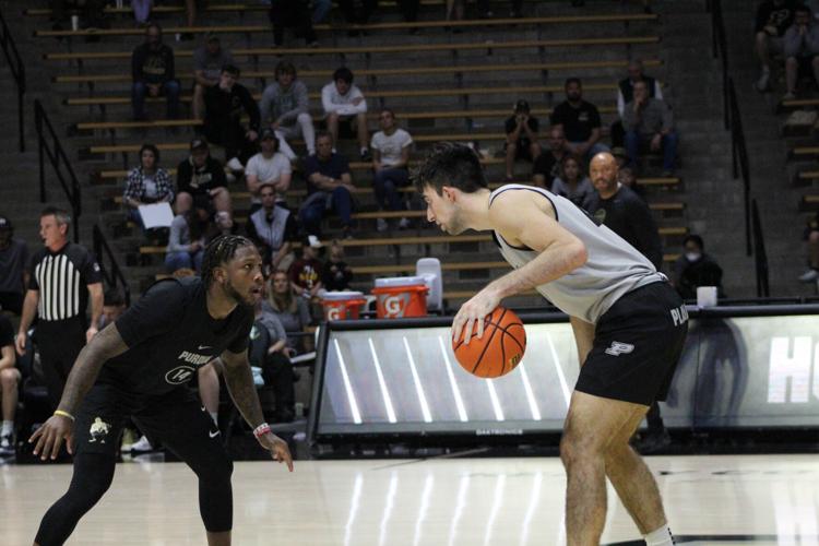 Two weeks out Basketball teams host Fan Day, offer autographs and hold