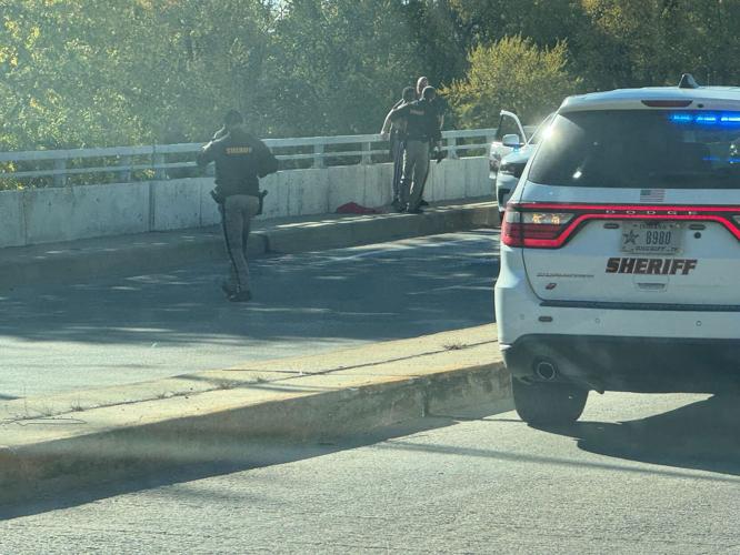 Alleged suspect appears to be arrested on bridge