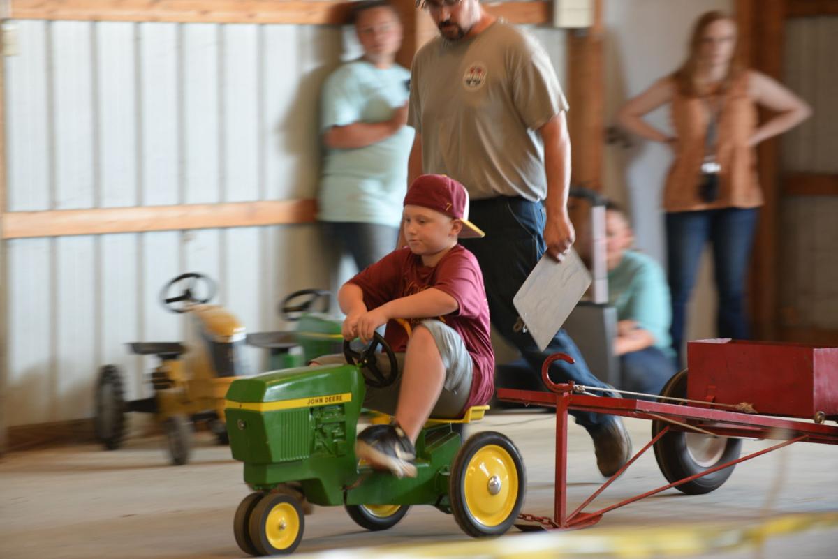 Children's traction tractor, Brady Martin