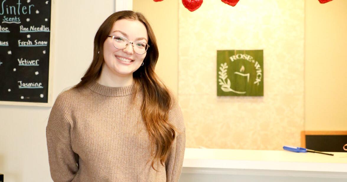 Recent grad building community through custom candles