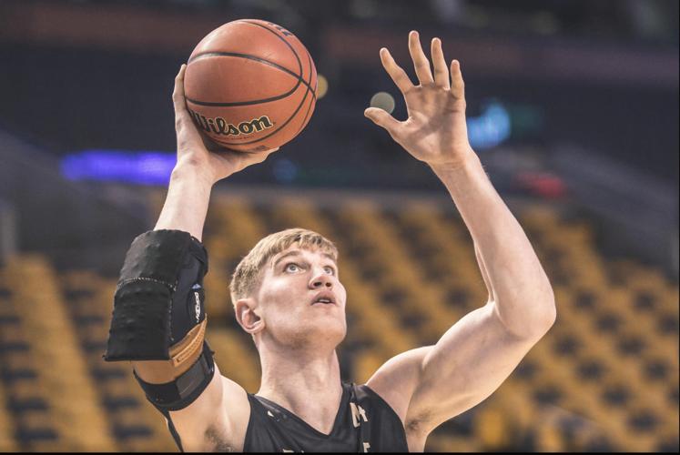 NCAA takes steps to permit Purdue's Isaac Haas to wear a brace on his  injured elbow