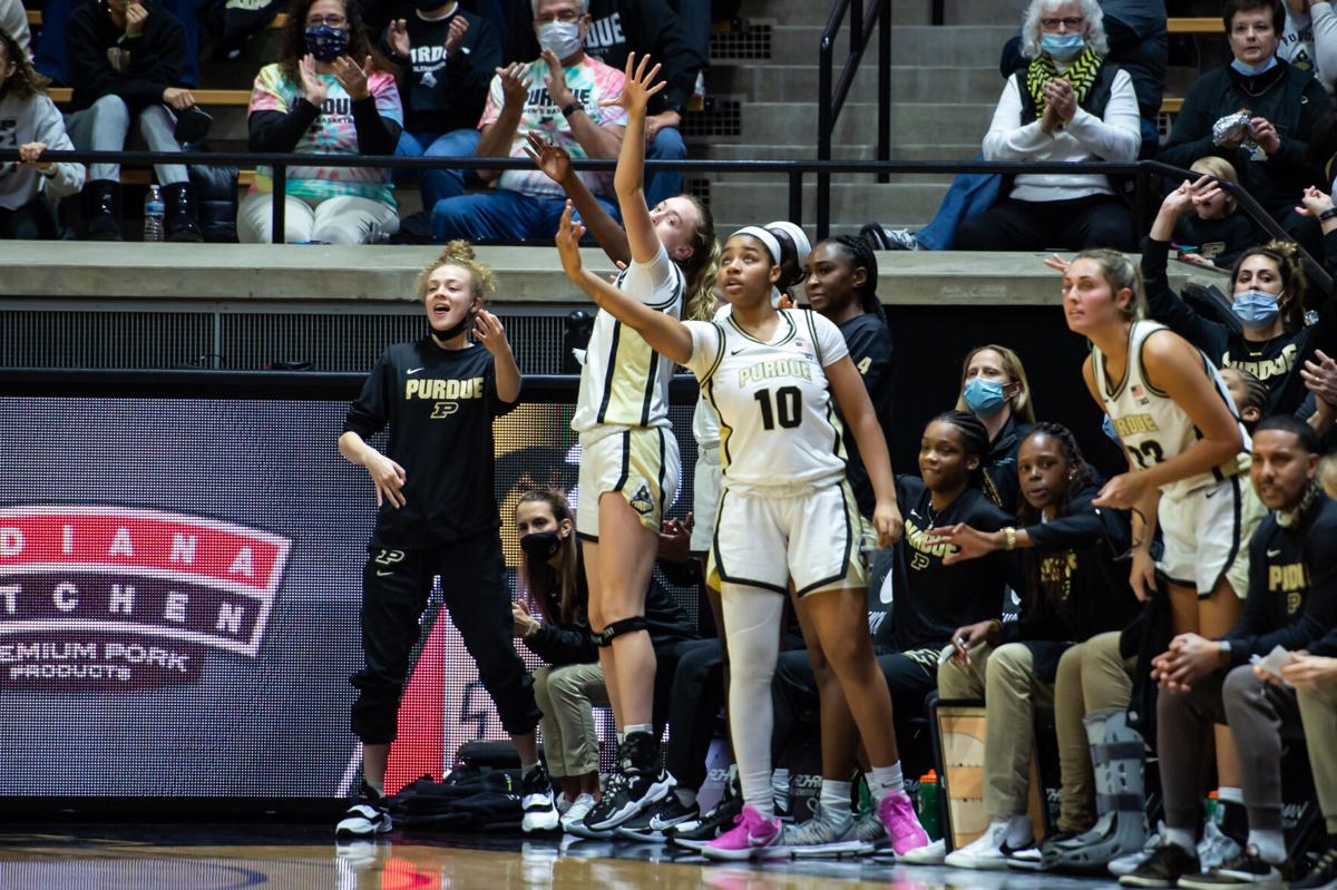 1/13/22 Iowa, Purdue bench celebrates a 3-pointer