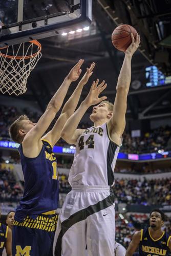 3/12/16 Big Ten Tournament, Michigan, Isaac Haas, Moritz Wagner |  Basketball | purdueexponent.org