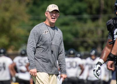 football brohm jeff practice purdue fall purdueexponent instructs complex coach players head during