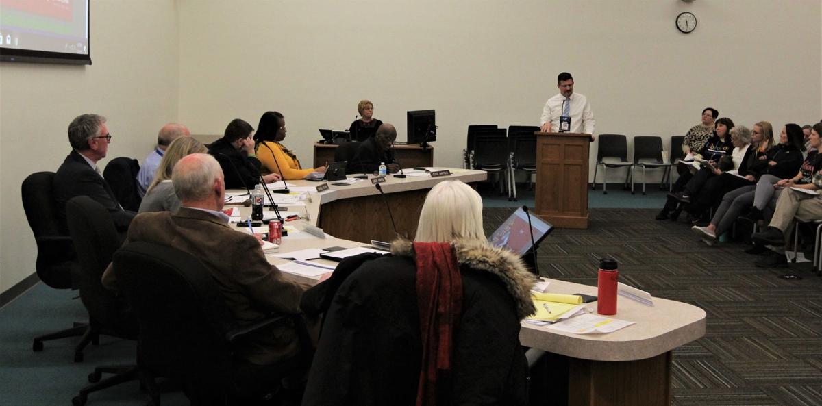 Davenport School Board approves budget cuts, including