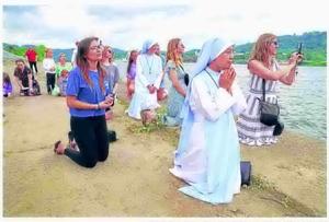 Devout Catholics press on with pilgrimage