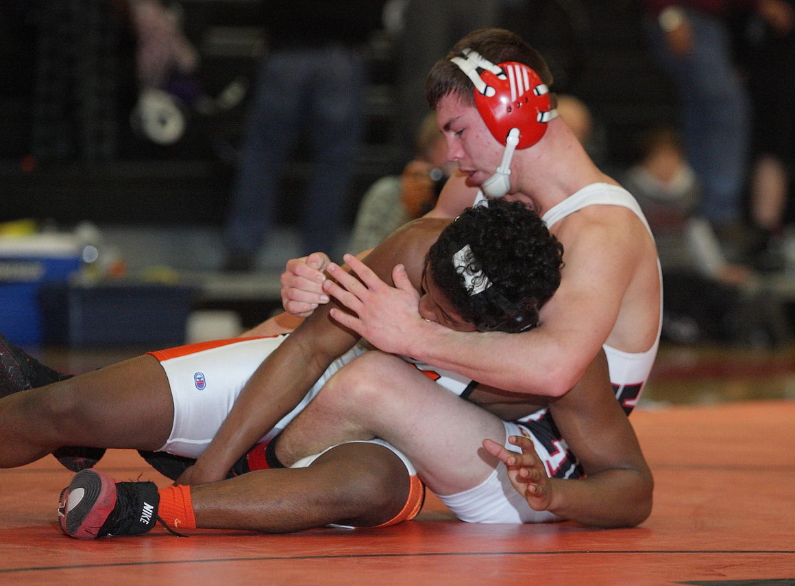 Q-C state wrestling qualifiers