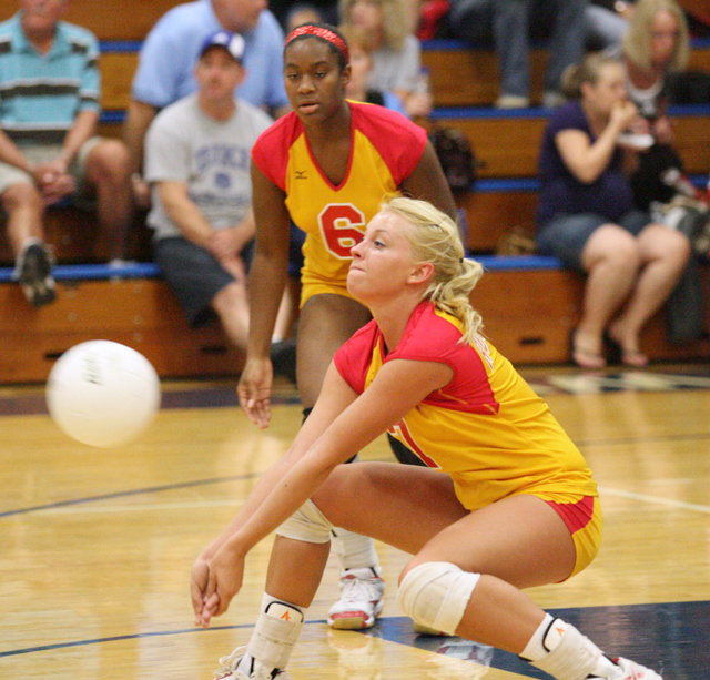 Quincy serves up volleyball victory over Rock Island