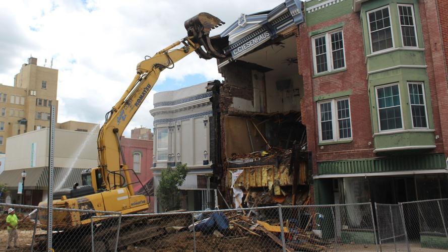 Demolition of buildings paused due to additional movement