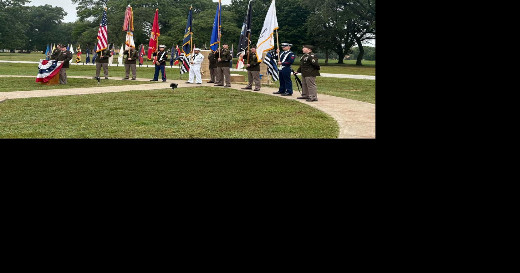 All Saints Catholic School choir sings at the 9/11 memorial at the Rock Island Arsenal