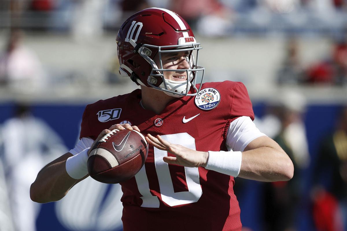 Mac Jones of the Alabama Crimson Tide warms up prior to the Vrbo Citrus Bowl against the Michigan Wolverines at Camping World Stadium on Jan. 1, 2020 in Orlando, Florida.