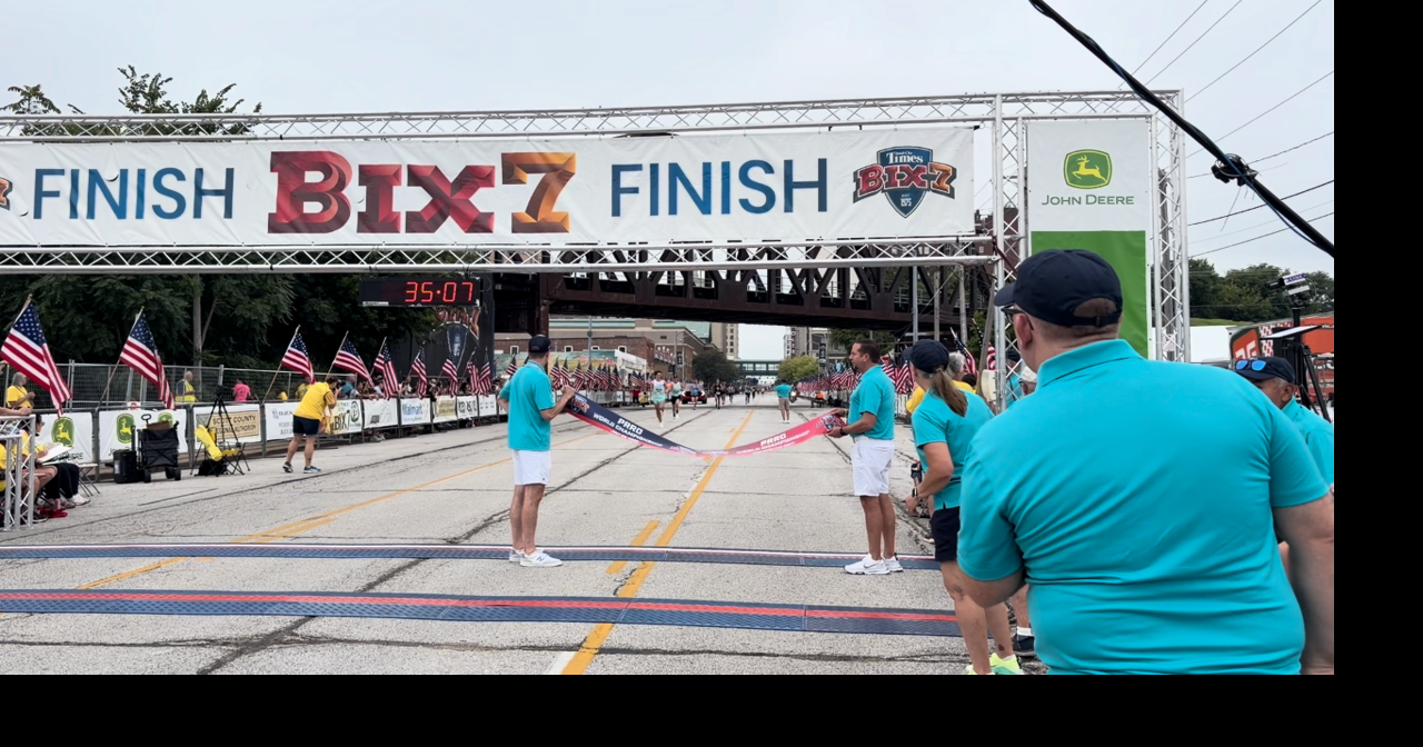 Everlyn Kemboi crosses the finish line and wins the women's 2026 Quad-City Times Bix 7